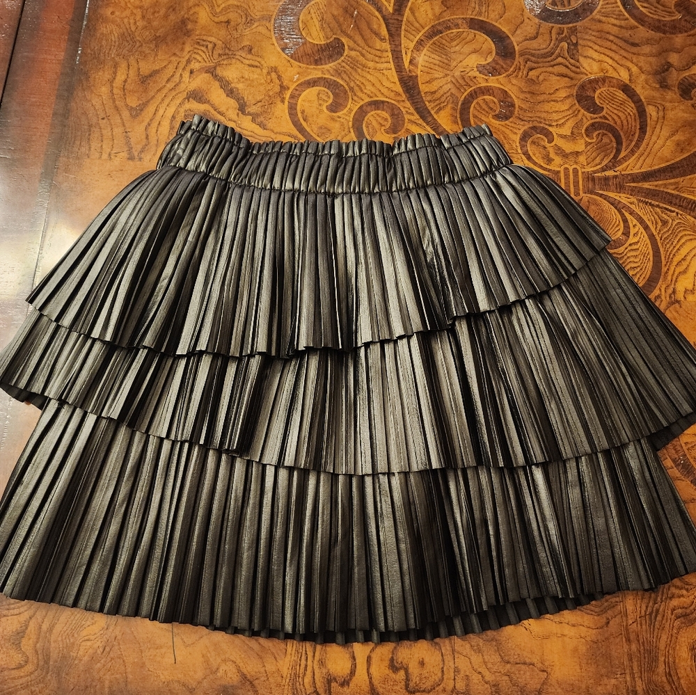 Womans black imitation leather skirt